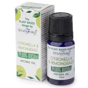 May include: A 10 ml bottle of Citronella & Lemongrass Plant Based Aroma Oil by Stamford Inc. The bottle is blue with a black cap and a white label with the product name and brand.