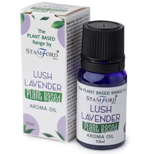 May include: A 10 ml bottle of Lush Lavender Plant Based Aroma Oil by Stamford Inc. The bottle is blue with a black cap and a white label with green text. The label says "The Plant Based Range by Stamford Inc. Lush Lavender Plant Based Aroma Oil 10ml."