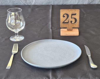 Rustic Corten steel table numbers with hardwood timber base – handcrafted unique décor for weddings, cafés, pubs, restaurants and events.