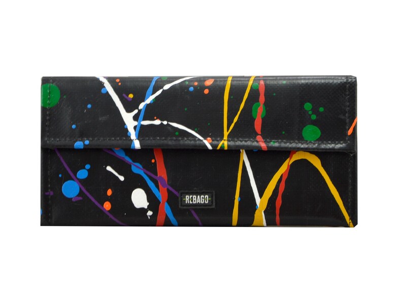 May include: Black wallet with a colourful paint splatter design. The wallet has a small logo that says "REBAGo".