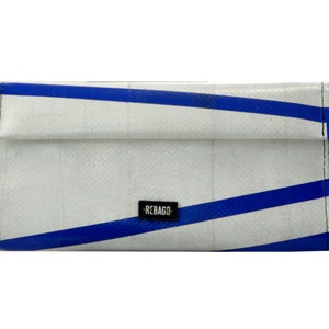 May include: White wallet with blue stripes and the word "REBAG" printed on the front.