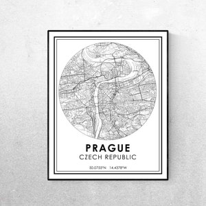 May include: Black and white map print of Prague, Czech Republic. The map shows the city's streets and landmarks. The text "Prague, Czech Republic" and the coordinates "50.0755°N 14.4378°W" are printed below the map.