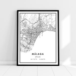 May include: Black and white line art map print of Málaga, Spain. The print includes the city name, "Málaga", and the country, "Spain", along with the coordinates 36.7167°N 4.4260°W.