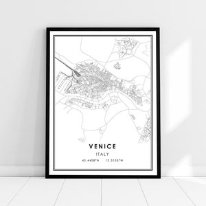 May include: A black and white line art map of Venice, Italy. The map shows the city's canals and streets. The text "VENICE" and "ITALY" is printed below the map, along with the coordinates "45.4408°N 12.3155°W".