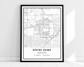 May include: Black and white map print of Notre Dame, Indiana. The map shows the streets and landmarks of the city. The text "NOTRE DAME INDIANA 41.7002°N 86.2379°W" is printed at the bottom of the map.