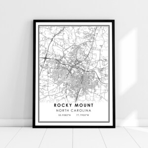 May include: Black and white map print of Rocky Mount, North Carolina. The map shows the city streets and landmarks. The text "Rocky Mount, North Carolina" and the coordinates "35.9382°N 77.7905°W" are printed below the map.