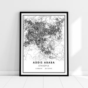 May include: Black and white map print of Addis Ababa, Ethiopia. The map shows the city's streets and landmarks. The text "Addis Ababa, Ethiopia, 8.9804°N 38.7578°E" is printed below the map.