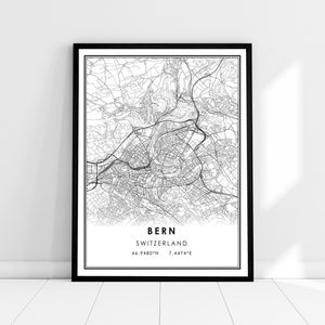 May include: Black and white map print of Bern, Switzerland. The map shows the city streets and landmarks. The text "Bern, Switzerland" and the coordinates "46.9480°N 7.4474°E" are printed below the map.