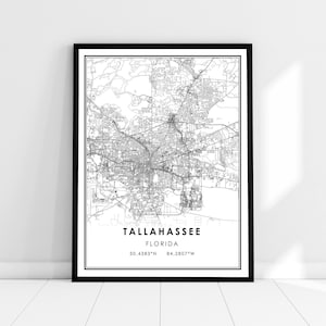 May include: Black and white map print of Tallahassee, Florida. The map shows the city streets and landmarks. The text "Tallahassee, Florida" and the coordinates "30.4383°N 84.2807°W" are printed below the map.