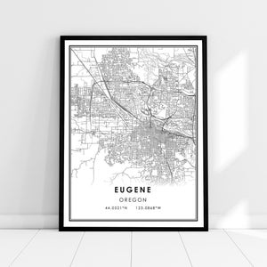 May include: Black and white line art map of Eugene, Oregon. The map shows the city streets and landmarks. The text "Eugene, Oregon" and the coordinates "44.0521°N 123.0868°W" are printed below the map.
