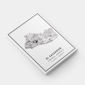 May include: A black and white line art map of El Salvador, Central America. The map shows the country's borders, major cities, and roads. The text "El Salvador, Central America 13.7942&deg;N 88.8965&deg;W" is printed below the map.