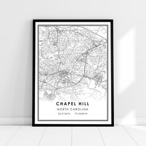 May include: Black and white line art map print of Chapel Hill, North Carolina. The print includes the city name, state, and coordinates: 35.9132°N 79.0558°W.