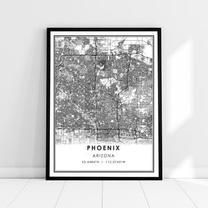 May include: Black and white map print of Phoenix, Arizona with the city name and coordinates, "33.4484°N | 112.0740°W", printed below the map.