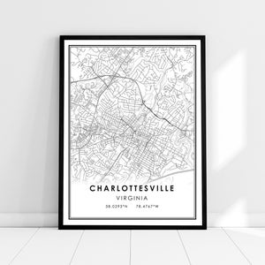 May include: Black and white line art map print of Charlottesville, Virginia. The map shows the city streets and landmarks. The text "CHARLOTTESVILLE VIRGINIA 38.0293°N 78.4767°W" is printed at the bottom of the map.