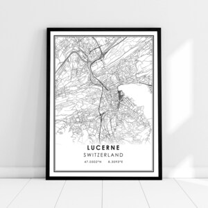 May include: A black and white map print of Lucerne, Switzerland. The map shows the city streets and landmarks. The text "Lucerne, Switzerland" and the coordinates "47.0502°N 8.3093°E" are printed below the map.