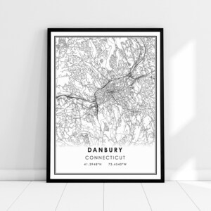 May include: Black and white line art map of Danbury, Connecticut. The map shows the city streets and surrounding area. The text "Danbury, Connecticut" and the coordinates "41.3948°N 73.4540°W" are printed below the map.