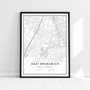 May include: Black and white map print of East Brunswick, New Jersey. The map shows the city streets and neighborhoods. The text at the bottom reads "East Brunswick, New Jersey, 40.4317°N, 74.4050°W".