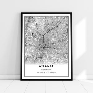 May include: Black and white map print of Atlanta, Georgia with the city name and coordinates: 33.7490°N | 84.3880°W.