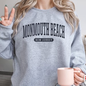 ヴィンテージ 90' USA製　MONMOUTH UNIVERSITY Monmouth University 名前とロゴステッカー ビニールデカール ノート