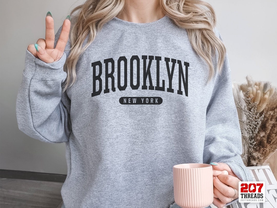 【DEARMINE】Ruckle Brooklyn Sweatshirt Amazon.com: Brooklyn Arched Red Text Pullover Hoodie