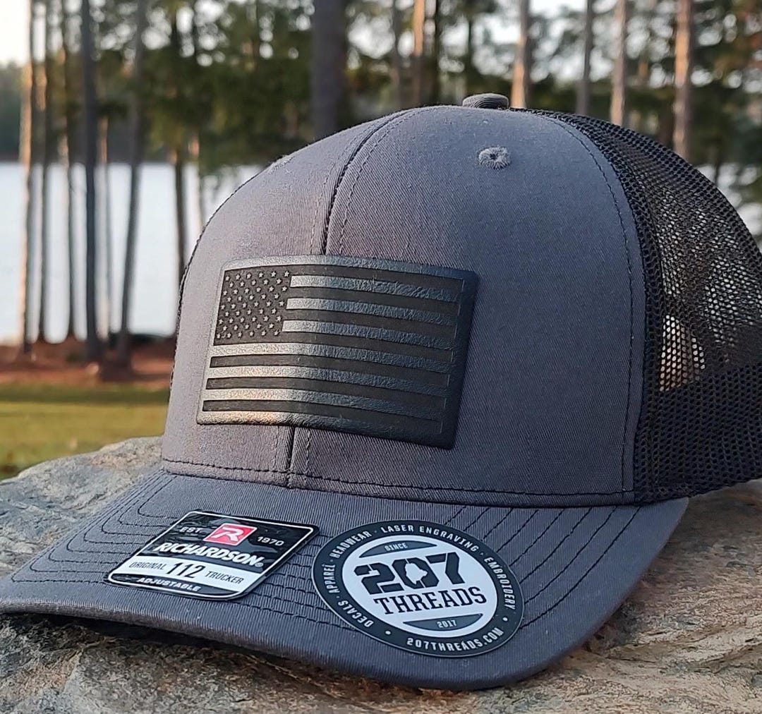 Black American Flag Patch Hat: Heathered Gray Trucker  Unk Dark Gray Hat with American Flag Patch main image 1