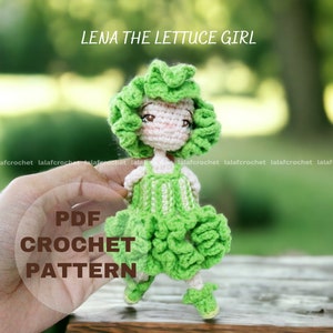 May include: A crochet pattern for a green lettuce girl doll. The doll has a green dress with white stripes and a green lettuce-like hairdo. The pattern is available as a PDF download.