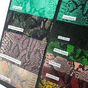 May include: A collection of fabric swatches in various colors and patterns, including jade suede, jade/black, dark olive, olive/tan/brown/blk, apple green, blush pink, light beige/light pink/purple, lipstick red, /brown/peach, and sunset yellow.