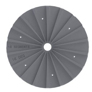 May include: A gray, circular object with 18 segments and a central hole. The text "18 SEGMENTS" and "16 DEG" are printed on the surface. Small holes are evenly spaced around the center. The object has a fan-like design.
