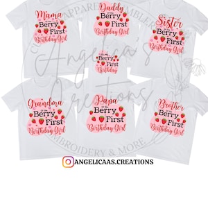 May include: Set of seven white t-shirts with pink and red strawberry graphics and text that reads "Mama of the Berry First Birthday Girl", "Daddy of the Berry First Birthday Girl", "Sister of the Berry First Birthday Girl", "Grandma of the Berry First Birthday Girl", "Papa of the Berry First Birthday Girl", "Brother of the Berry First Birthday Girl", and "It's My Berry First Birthday".