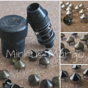 May include: An assortment of metal studs and tools for leathercraft. The image shows various sizes and styles of studs, including cone-shaped and star-shaped designs. The tools include a cylindrical punch and a spring-loaded setting tool. The text "Minkus Margo" is visible.