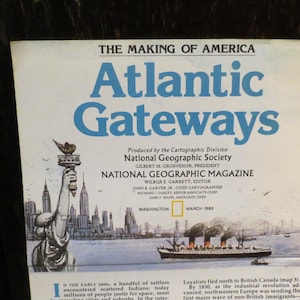 May include: A vintage National Geographic Magazine cover titled "Atlantic Gateways." The cover features an illustration of the Statue of Liberty, a cityscape, and a steamship. The text includes "The Making of America" and "March 1983."