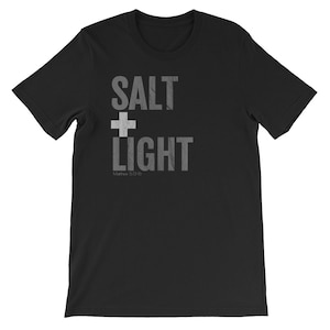 May include: Black t-shirt with white text that reads "SALT + LIGHT" and "Matthew 5:13-16".