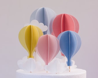 5 hot air balloon cake toppers in wafer cake. Wafer paper hot air balloon cake topper for birthday cakes rainbow colors