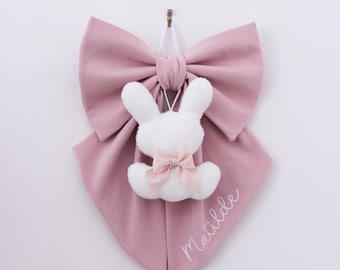 Pastel pink baby girl birth bow