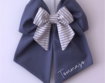 Baby boy birth bow in blue cotton
