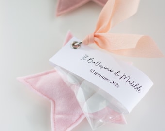 Pink and powder star favor or placeholder, complete with confetti, for a birth or baptism