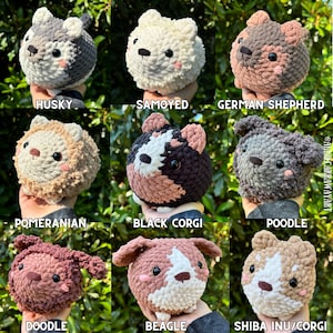 May include: A collection of nine crocheted dog plushies, each in a different breed, including a Husky, Samoyed, German Shepherd, Pomeranian, Black Corgi, Poodle, Doodle, Beagle, and Shiba Inu/Corgi. Each plushie is round with small black eyes and a contrasting snout.