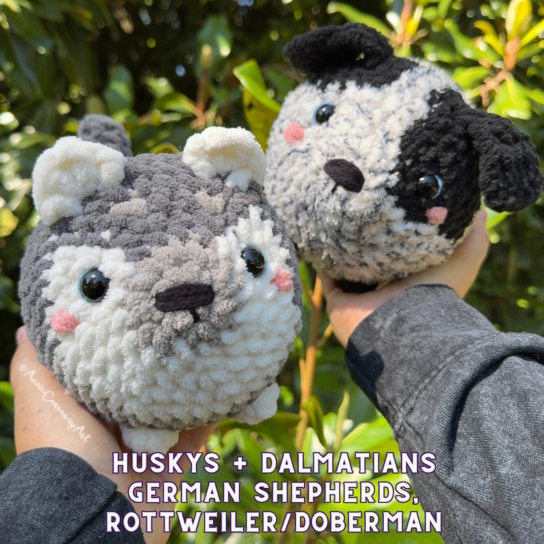 May include: Two plush dog toys, one a husky with gray, white, and black yarn, the other a Dalmatian with black and white yarn. Both have black eyes and pink cheeks. The text at the bottom reads "HUSKYS + DALMATIANS GERMAN SHEPHERDS, ROTTWEILER/DOBERMAN."