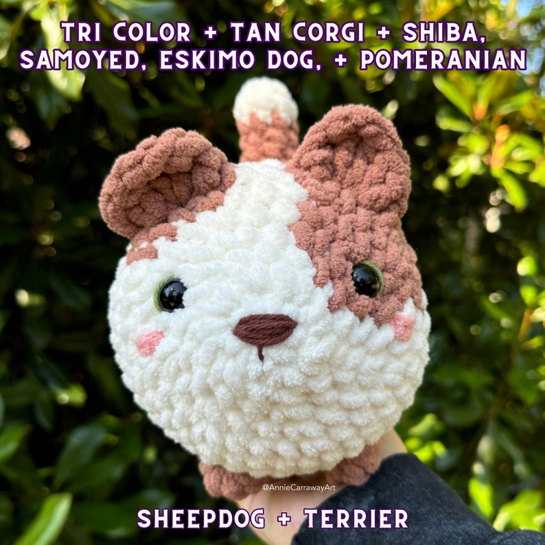 May include: A handmade, plush dog toy in white, brown, and tan. The toy has large, black eyes, a brown nose, and pink cheeks. The text on the image reads "TRI COLOR + TAN CORGI + SHIBA, SAMOYED, ESKIMO DOG, + POMERANIAN" and "SHEEPDOG + TERRIER".