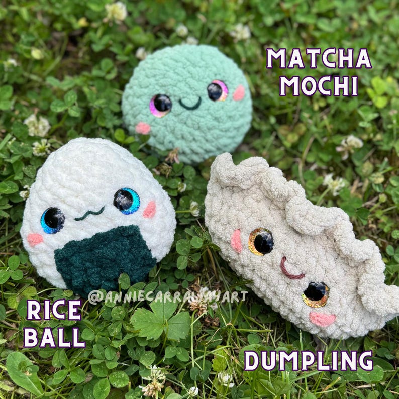 May include: Three crocheted food plushies: a green Matcha Mochi, a white Rice Ball with seaweed, and a beige Dumpling. Each has embroidered eyes, rosy cheeks, and a smiling mouth. The text "Matcha Mochi", "Rice Ball", and "Dumpling" are displayed.