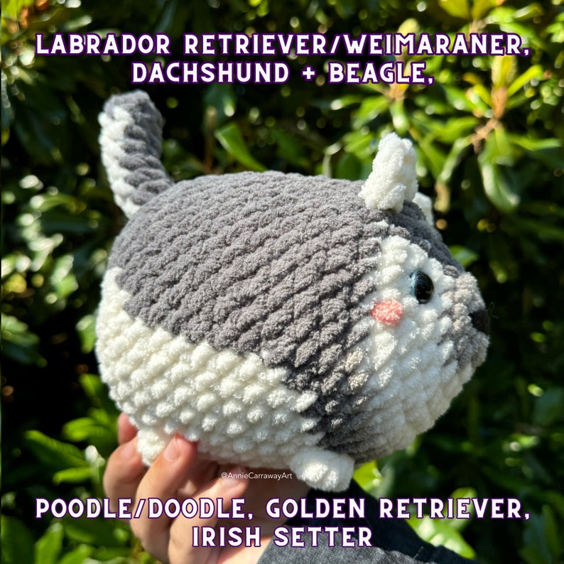 May include: A handmade, plush dog toy in gray, white, and black. The toy has a rounded shape with a tail and small ears. The text on the image reads "LABRADOR RETRIEVER/WEIMARANER, DACHSHUND + BEAGLE, POODLE/DOODLE, GOLDEN RETRIEVER, IRISH SETTER."