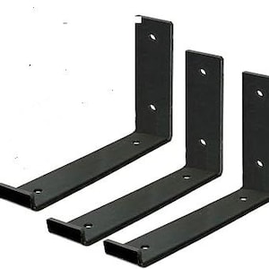 May include: Set of three black metal shelf brackets. Each bracket has four holes for mounting.