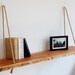 unique hanging shelf made of oak wood / bookcase / wall shelf 