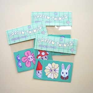 Pacchetto adesivi Garden Things!, 6 adesivi in vinile illustrati con personaggi del giardino