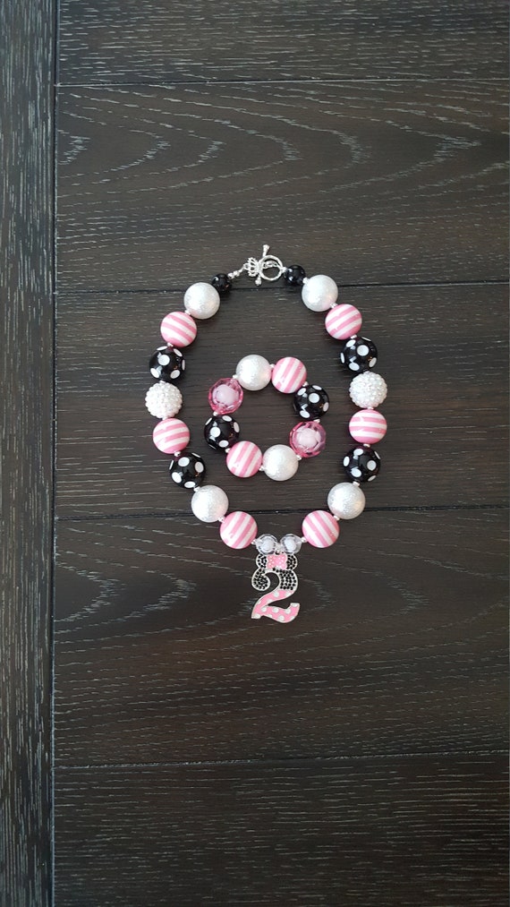 Disney Silver and Pink Charm Necklace and Bracelet Set Amazon.com: Disney Princess Necklace, Bracelet, and Charms  main image 2