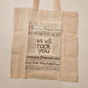 Bolsa de tela/compras con frases y letras de "We Will Rock You" - Lona natural