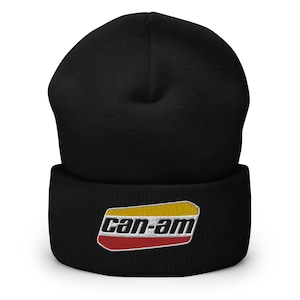 May include: Black beanie with a red, yellow, and white embroidered "Can-Am" logo.