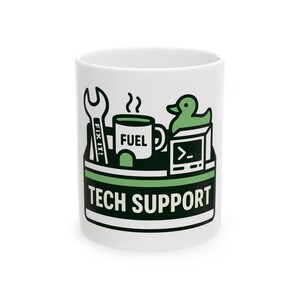 May include: A white ceramic mug featuring a graphic of a toolbox containing a wrench labeled FIX IT!, a mug labeled FUEL, a rubber duck, and a computer monitor with a command prompt symbol. The text TECH SUPPORT is printed in bold black letters.