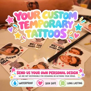 May include: A collection of square temporary tattoos featuring individual portrait photos of people, with some designs including the text "WILL YOU MARRY ME?" or "WE THE BRIDE". The tattoos are arranged on a flat surface with a black stylus pen.