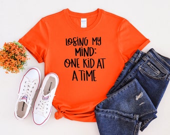 T-shirt Perdre la tête un enfant à la fois